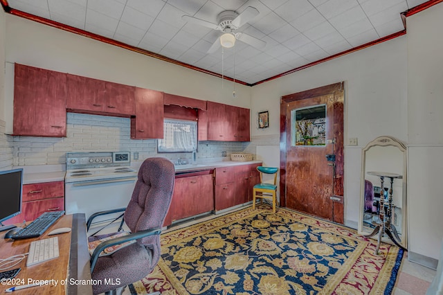 office space with ceiling fan and sink