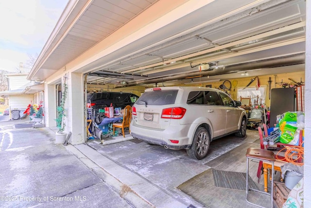 garage featuring a garage door opener