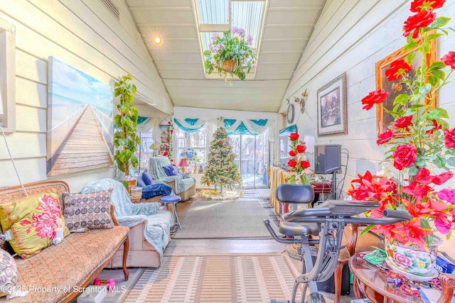 sunroom / solarium with vaulted ceiling