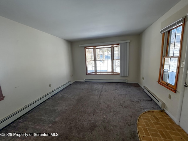 203 Willow Rd, Dalton, PA 18414 - carpeted empty room with baseboard heating, a baseboard radiator, and plenty of natural light