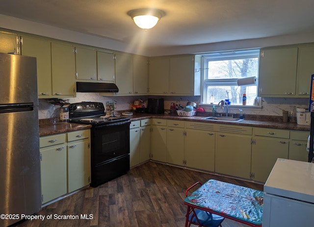 kitchen featuring sink, dark wood-type flooring, black / electric stove, and stainless steel refrigerator