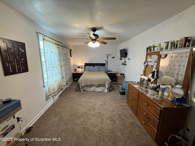 bedroom featuring carpet, ceiling fan, and baseboards