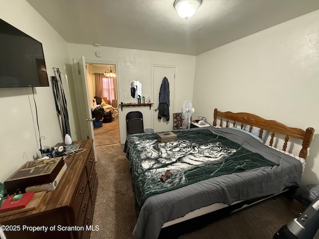 bedroom featuring carpet flooring