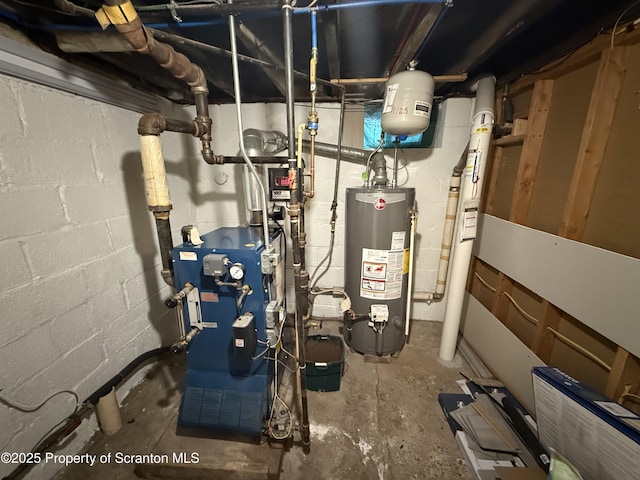 utility room featuring water heater and a heating unit