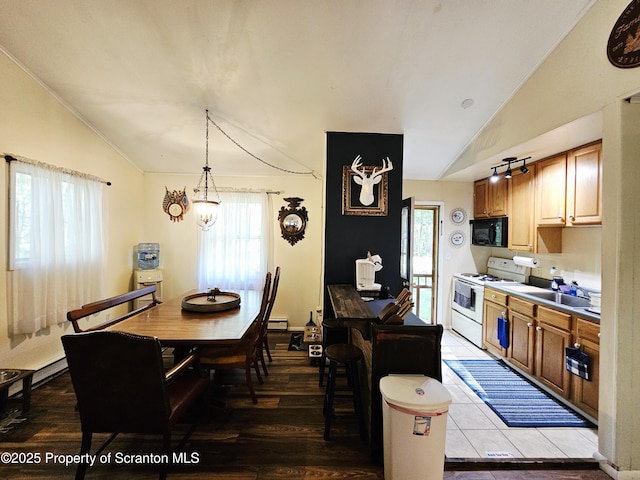 55 Lyman Ln, Gouldsboro, PA 18424 - dining space featuring vaulted ceiling, crown molding, and dark wood-style flooring