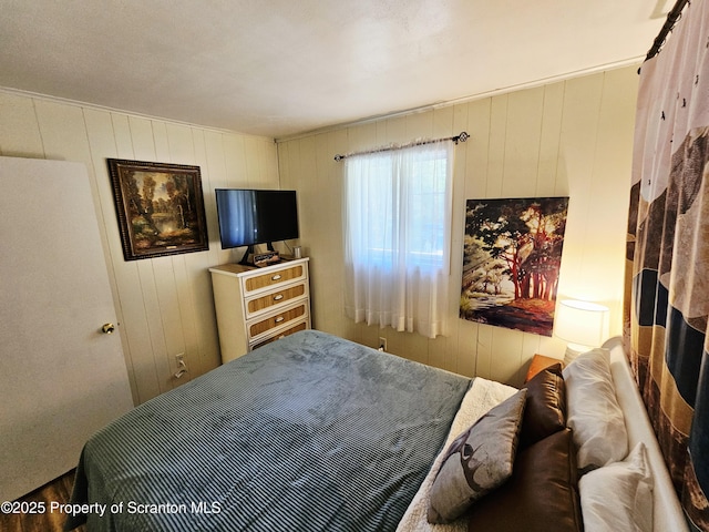 55 Lyman Ln, Gouldsboro, PA 18424 - bedroom featuring wood walls