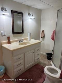 full bathroom with toilet and vanity