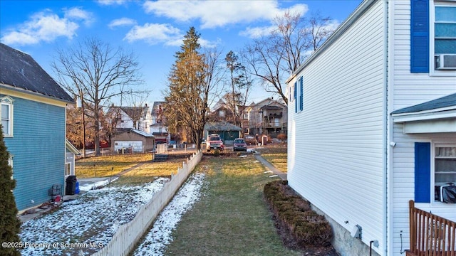 view of yard layered in snow