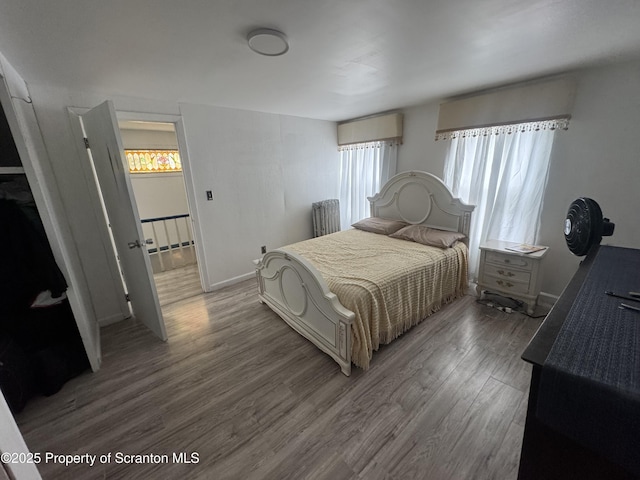 335 Railroad Ave, Scranton, PA 18505 - bedroom with wood finished floors and baseboards