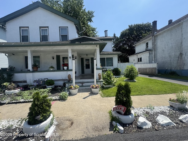 335 Railroad Ave, Scranton, PA 18505 - view of front of house with a porch, stucco siding, and roof with shingles