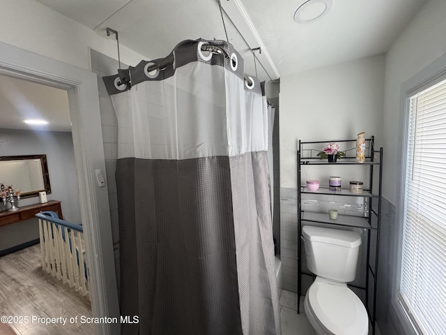 335 Railroad Ave, Scranton, PA 18505 - full bath with a shower with shower curtain and wood finished floors