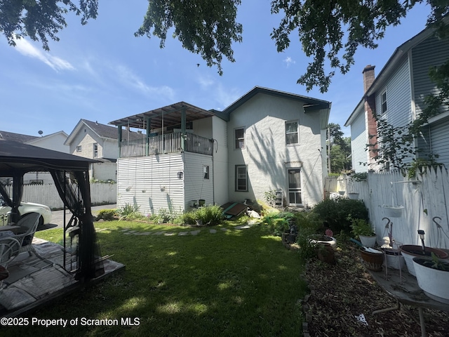 335 Railroad Ave, Scranton, PA 18505 - back of house with a gazebo, stucco siding, a balcony, and a patio area