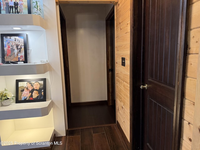 hall with elevator and dark hardwood / wood-style flooring