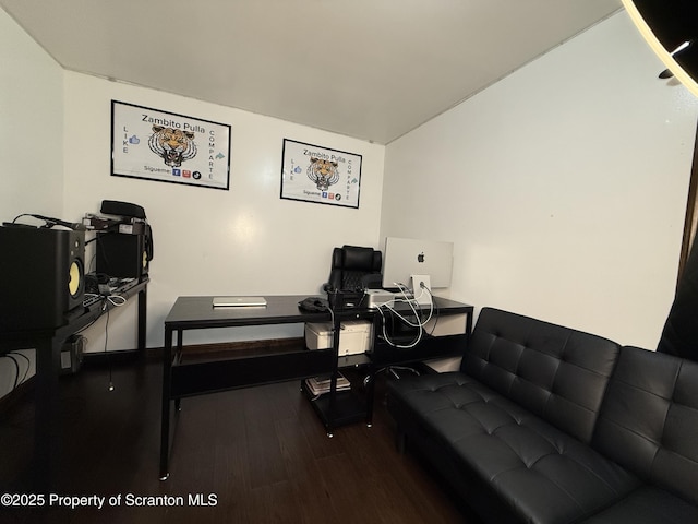 office featuring hardwood / wood-style floors and vaulted ceiling