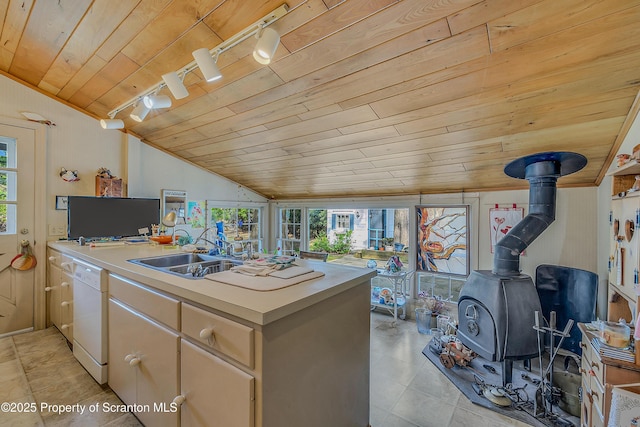 kitchen with wooden ceiling, white dishwasher, track lighting, vaulted ceiling, and plenty of natural light
