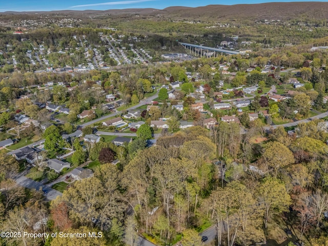 aerial view of property's location featuring mountains