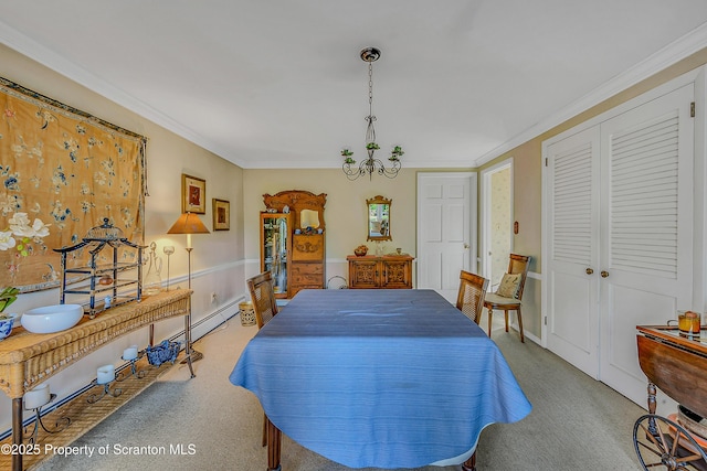 carpeted bedroom featuring ornamental molding, a closet, and a baseboard heating unit