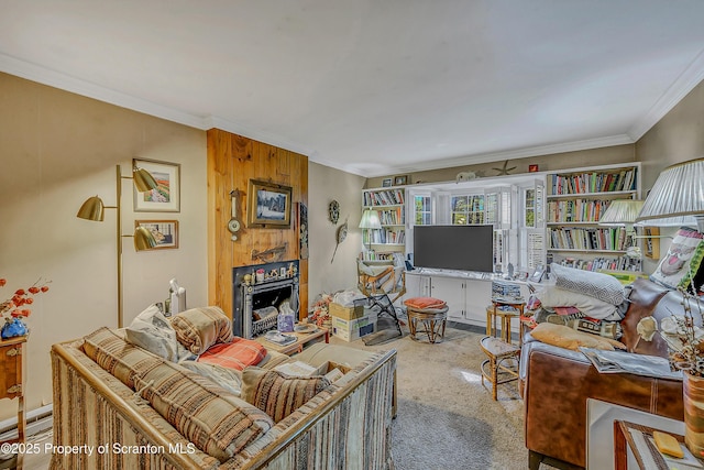 carpeted living room featuring crown molding and a fireplace