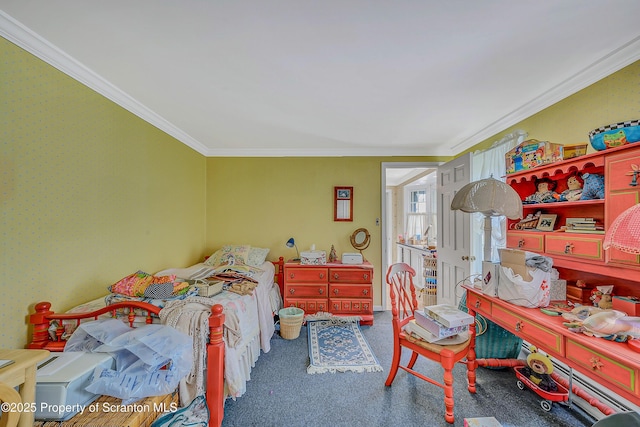 bedroom featuring crown molding and carpet