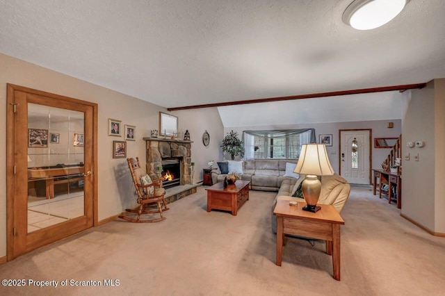 37 S Lehigh River Dr, Clifton Twp, PA 18424 - living room with light carpet, a fireplace, a textured ceiling, and baseboards