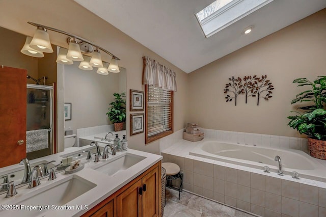 37 S Lehigh River Dr, Clifton Twp, PA 18424 - bathroom with a garden tub, a shower stall, toilet, a skylight, and lofted ceiling