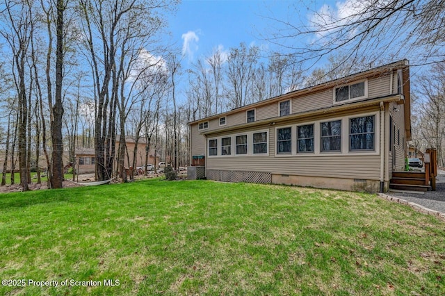 37 S Lehigh River Dr, Clifton Twp, PA 18424 - rear view of house with crawl space and a lawn