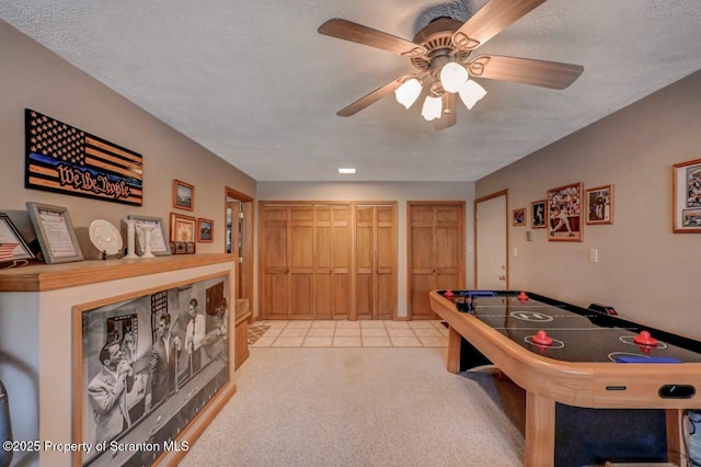 37 S Lehigh River Dr, Clifton Twp, PA 18424 - recreation room featuring carpet floors, a ceiling fan, and a textured ceiling