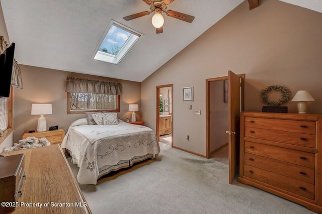 37 S Lehigh River Dr, Clifton Twp, PA 18424 - bedroom with a skylight, light colored carpet, ensuite bath, baseboards, and high vaulted ceiling