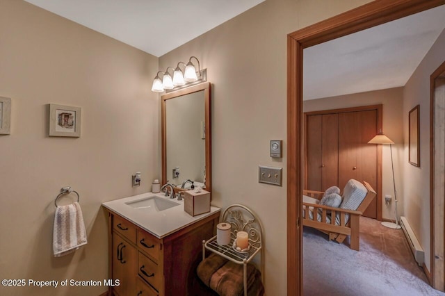 37 S Lehigh River Dr, Clifton Twp, PA 18424 - bathroom featuring a baseboard radiator, vanity, and baseboards