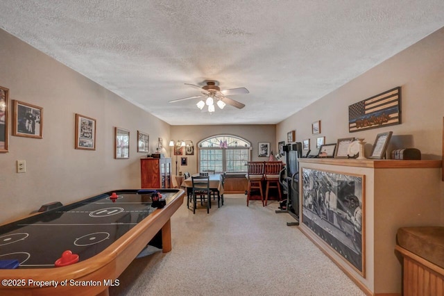 37 S Lehigh River Dr, Clifton Twp, PA 18424 - rec room with ceiling fan, a textured ceiling, and carpet