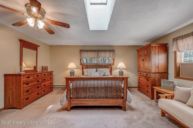 37 S Lehigh River Dr, Clifton Twp, PA 18424 - bedroom with light carpet, baseboard heating, ceiling fan, and baseboards