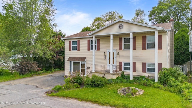 609 Landmesser Ave, West Hazleton, PA 18202 - split foyer home featuring driveway and a chimney