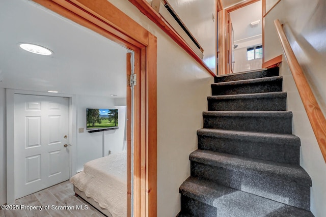 3222 Bluebird Dr, Bushkill, PA 18324 - stairway with wood finished floors