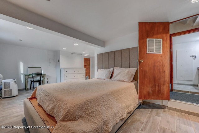 3222 Bluebird Dr, Bushkill, PA 18324 - bedroom featuring visible vents, light wood-style flooring, beamed ceiling, and recessed lighting
