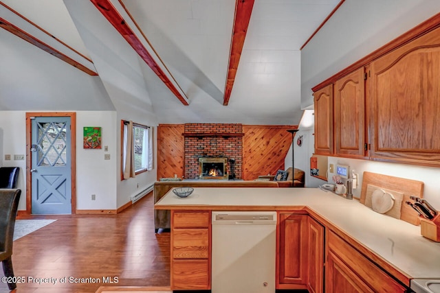 3222 Bluebird Dr, Bushkill, PA 18324 - kitchen featuring a peninsula, dishwasher, open floor plan, light countertops, and vaulted ceiling with beams