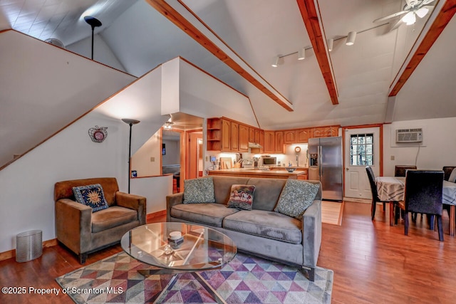 3222 Bluebird Dr, Bushkill, PA 18324 - living room with light wood-type flooring, high vaulted ceiling, ceiling fan, and track lighting