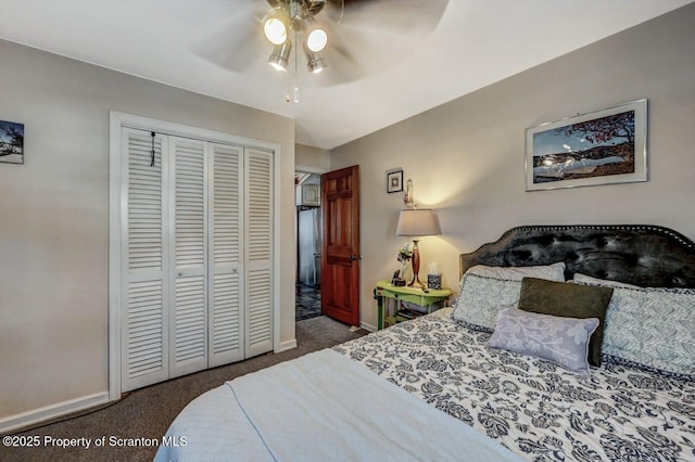 bedroom with ceiling fan, carpet floors, and a closet