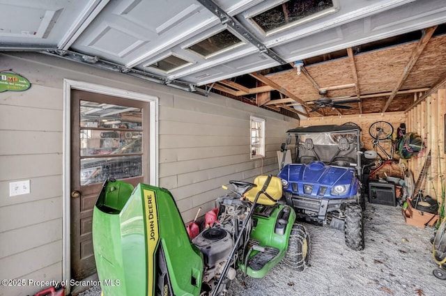 garage with wood walls