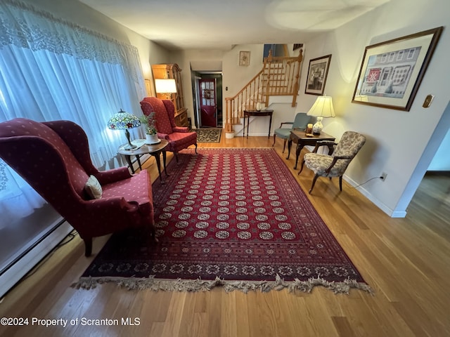 living area featuring hardwood / wood-style floors