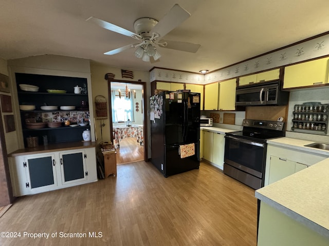 kitchen with ceiling fan, sink, light hardwood / wood-style floors, and appliances with stainless steel finishes