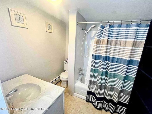 full bathroom with tile patterned floors, vanity, baseboard heating, shower / bath combo with shower curtain, and toilet