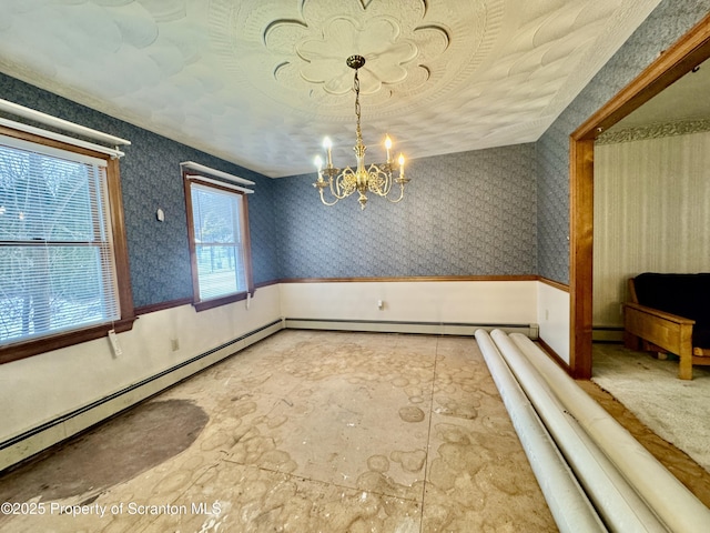 unfurnished dining area featuring a baseboard heating unit and a notable chandelier