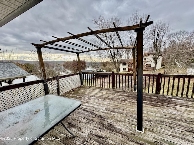 wooden deck with a pergola