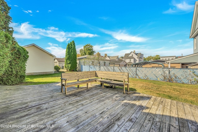 wooden deck with a yard