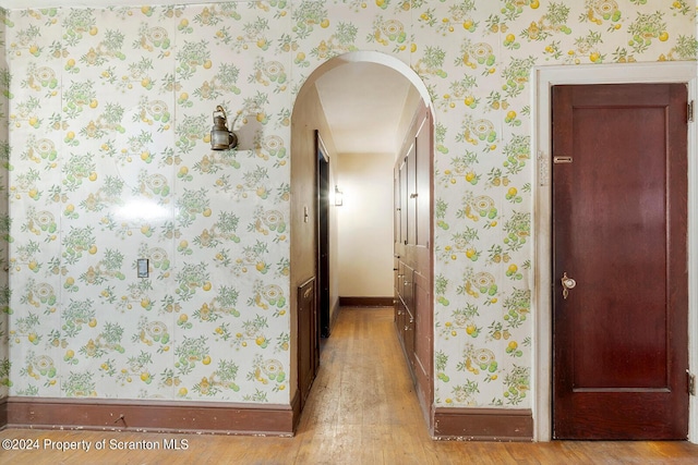 hall with light wood-type flooring