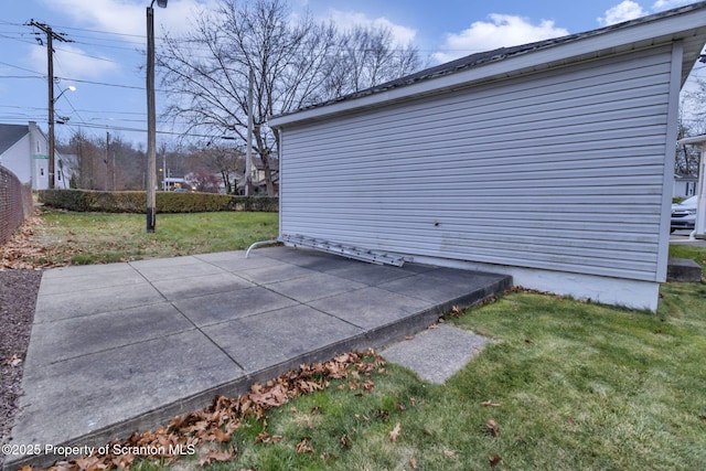 exterior space featuring a patio area and a yard