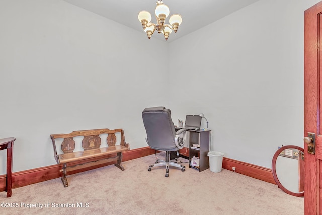 office featuring light colored carpet and a chandelier