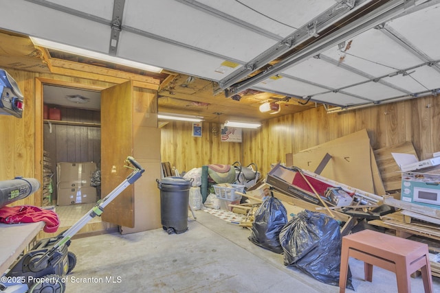 garage with wood walls