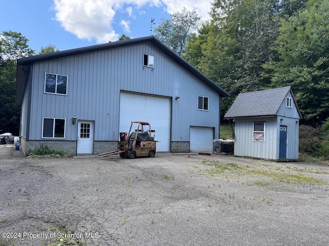 exterior space with a garage