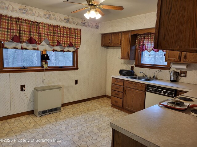 1445 Heart Lake Rd, Scott Twp, PA 18433 - kitchen featuring dishwasher, ceiling fan, heating unit, and light countertops